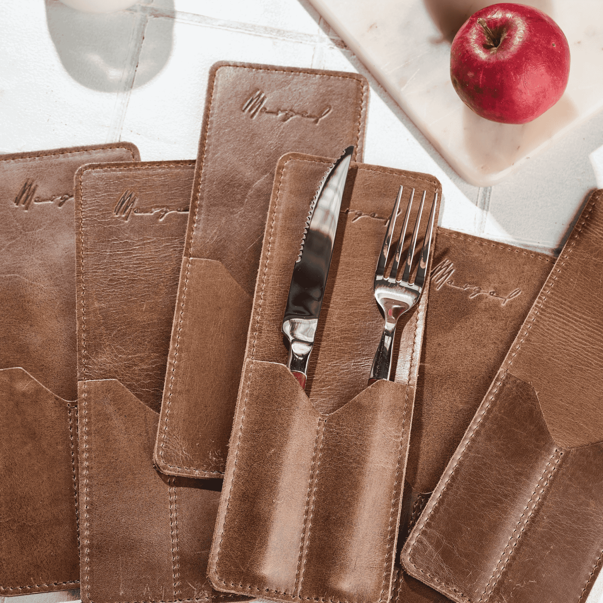 Leather cutlery pockets in a set of 4 in brown