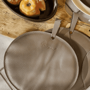 Leather pot holders in beige, set of 2