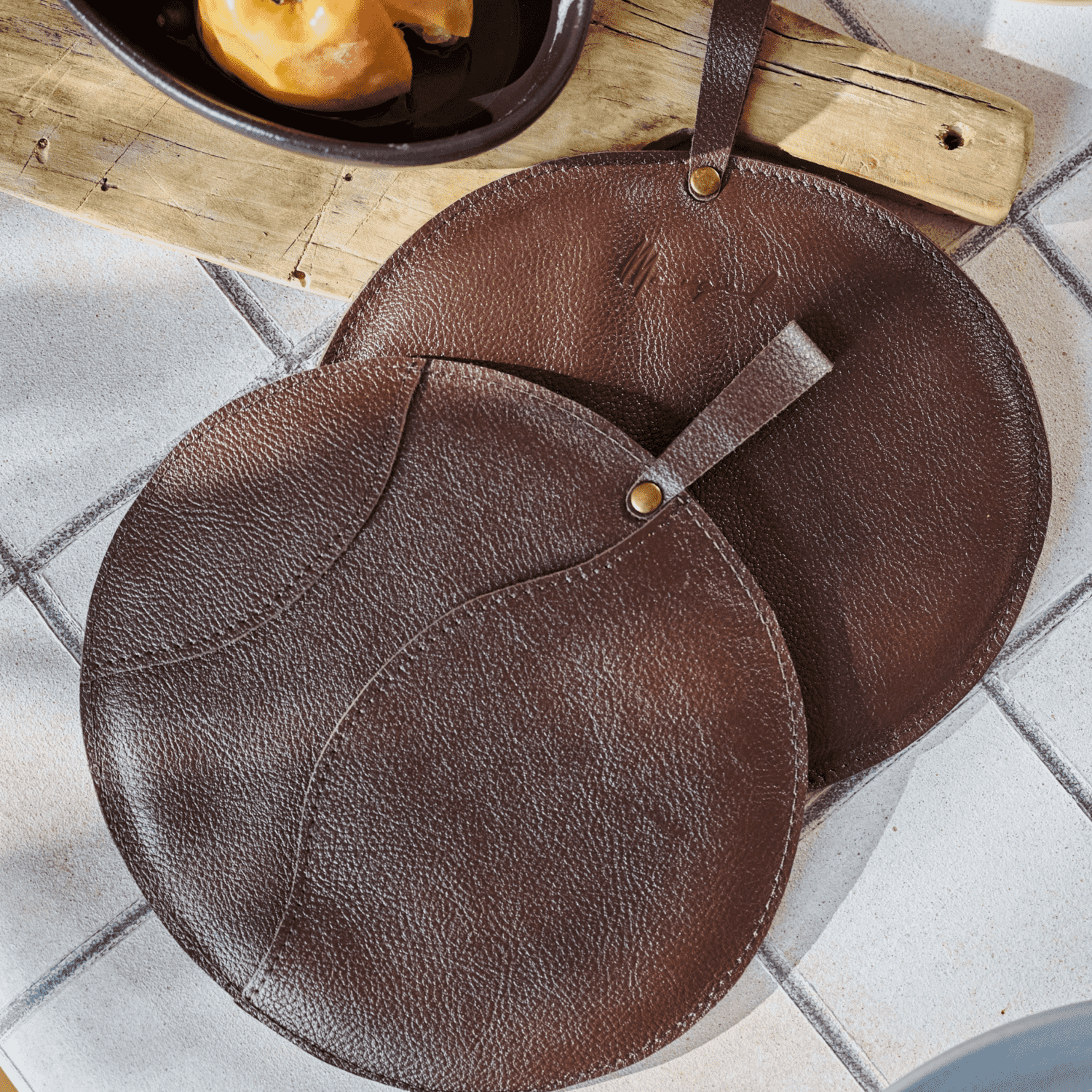 Leather pot holders in brown, set of 2