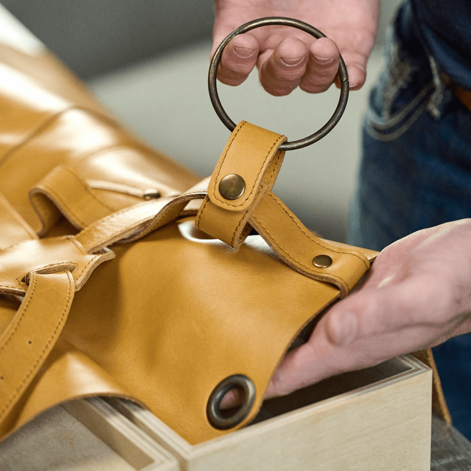 Crossback apron No. 63 made of cowhide in amber