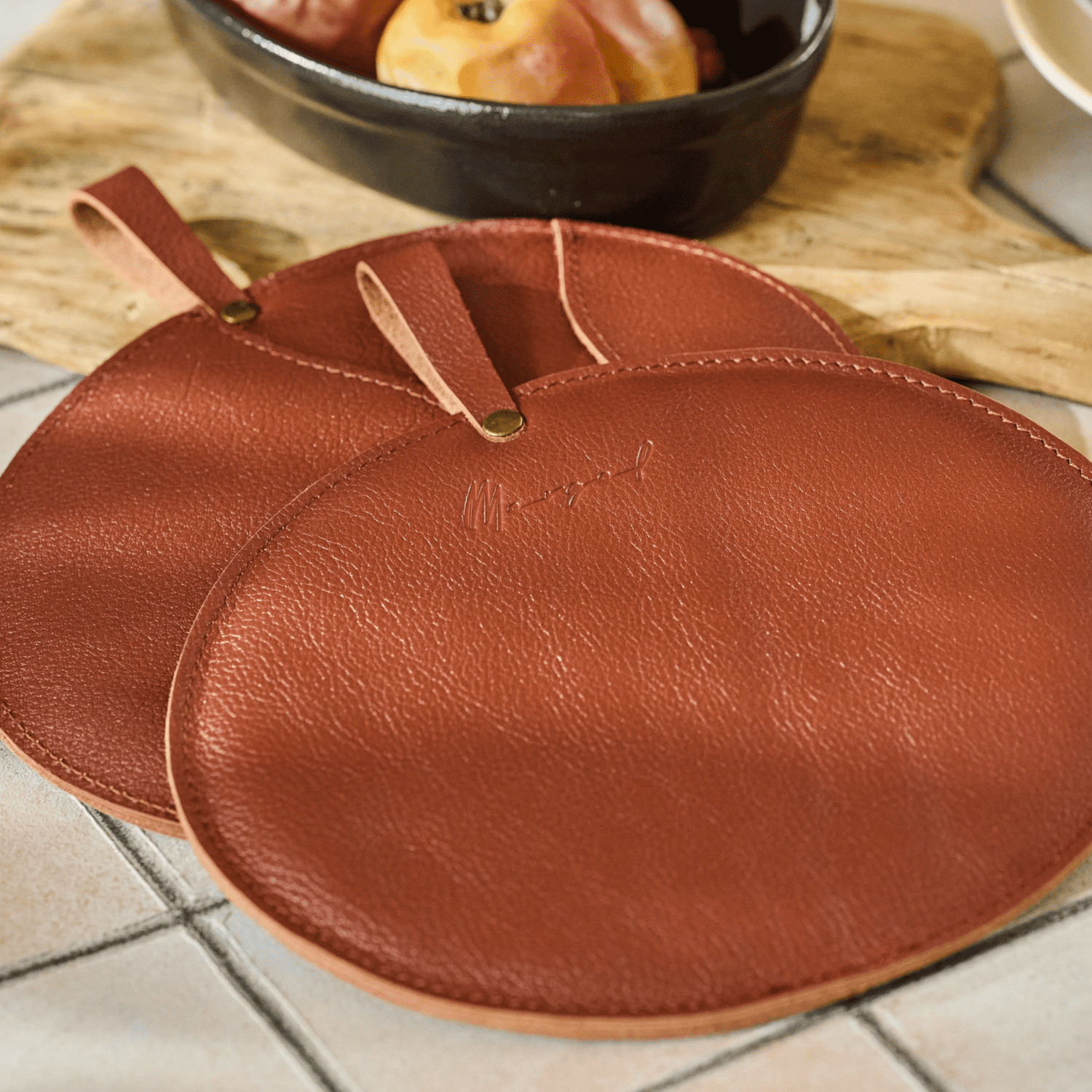 Leather pot holders in burgundy, set of 2