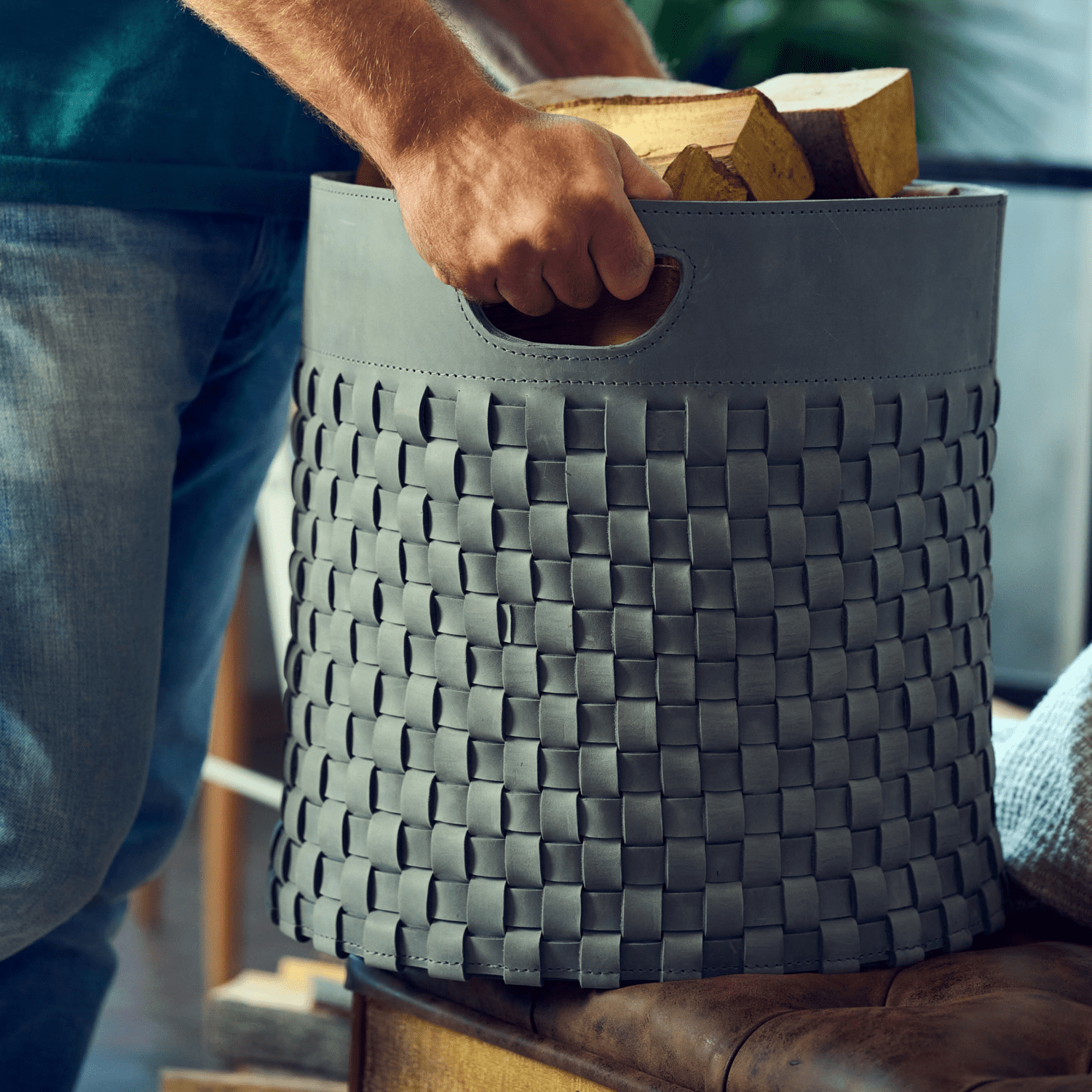 Woven firewood basket in blue-grey