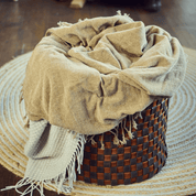 Woven firewood basket in chocolate brown/cognac