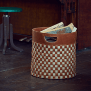 Woven firewood basket in cognac/beige