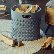 Woven firewood basket in blue-grey