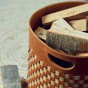 Woven firewood basket in cognac/beige