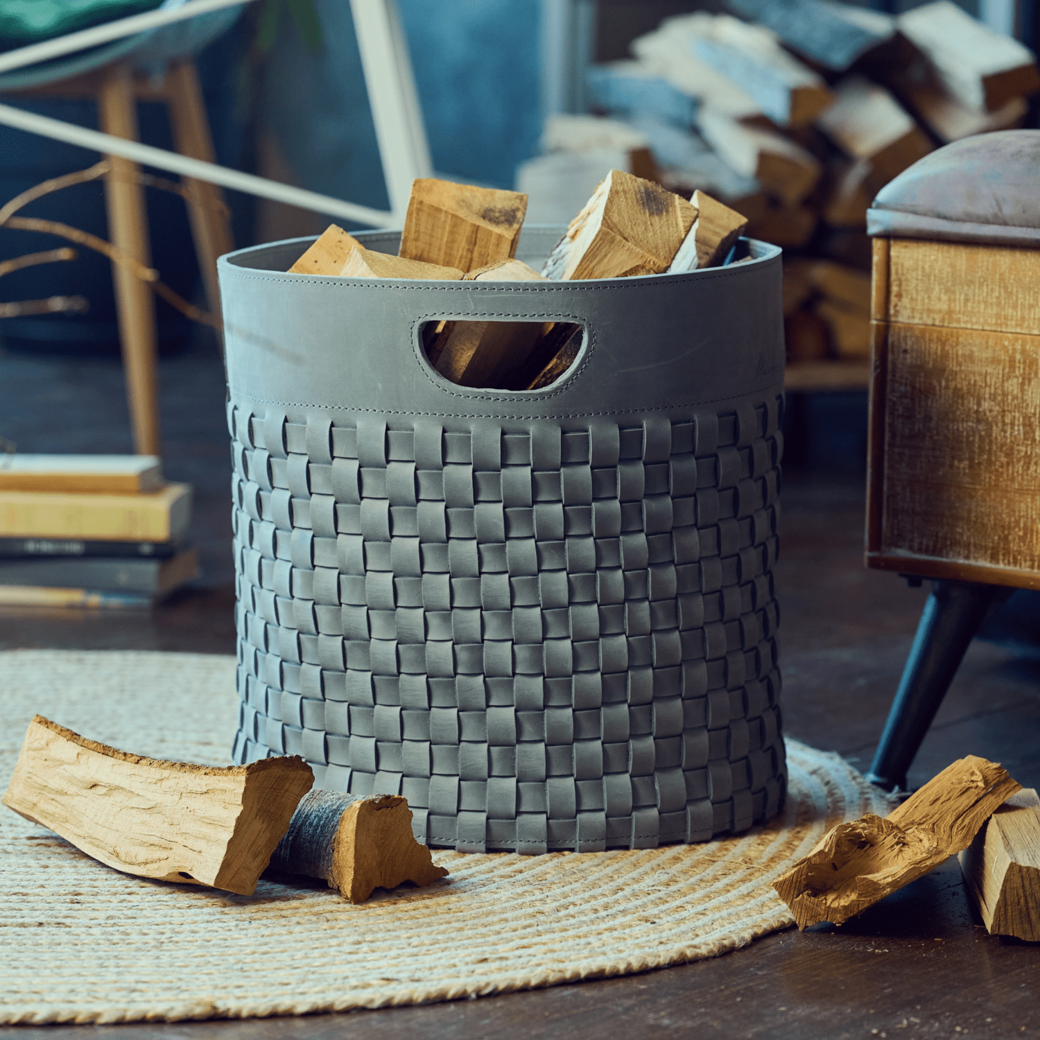 Woven firewood basket in blue-grey