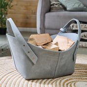 Leather firewood basket in cognac
